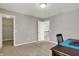 Bright office space with closet, doorway, and desk creating a functional work area at 4546 Creighton Ln, Indianapolis, IN 46237