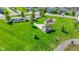 Community playground and gazebo surrounded by green spaces and a tranquil pond at 4638 W Otway Ln, New Palestine, IN 46163