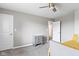 Bedroom featuring neutral walls, carpet flooring, and closet space at 4638 W Otway Ln, New Palestine, IN 46163