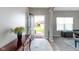 Bright entryway with hardwood floors, a console table, and a view of the front yard creating a welcoming atmosphere at 4638 W Otway Ln, New Palestine, IN 46163