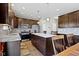 Spacious kitchen with granite countertops, stainless steel appliances, and ample cabinet storage at 4638 W Otway Ln, New Palestine, IN 46163