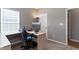 Functional office space with desk, comfortable chair, and modern lighting at 4638 W Otway Ln, New Palestine, IN 46163
