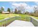 This home features a spacious back deck, great for outdoor entertaining and relaxing with a view of the large grassy backyard at 5302 E 46Th St, Indianapolis, IN 46226