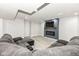 Basement living room with recessed lighting, fireplace and comfortable seating at 5302 E 46Th St, Indianapolis, IN 46226