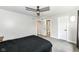 This bedroom features new carpets, ceiling fan and access to the ensuite bathroom at 5302 E 46Th St, Indianapolis, IN 46226
