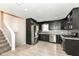 Beautiful kitchen with stainless steel appliances, sleek cabinets, and wood-look flooring at 5302 E 46Th St, Indianapolis, IN 46226