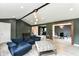 Open-concept layout connecting the living room with the dining area, highlighting a unified and stylish living space at 5302 E 46Th St, Indianapolis, IN 46226