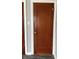 Interior wooden door with classic hardware, adding a touch of vintage charm at 5428 Speedway Dr, Indianapolis, IN 46224