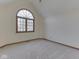 Bedroom featuring a large arched window, neutral walls, and carpet at 5461 Steven Dr, Greenwood, IN 46142