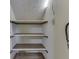 Walk-in closet featuring white walls and built-in shelving at 5461 Steven Dr, Greenwood, IN 46142