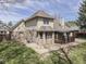 Home exterior shows brick and siding, deck with gazebo and a stone firepit in the yard at 5461 Steven Dr, Greenwood, IN 46142