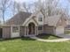 Charming two-story brick home with well-manicured lawn and inviting front entrance at 5461 Steven Dr, Greenwood, IN 46142