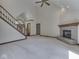 Spacious living room with stairs, fireplace, and lots of natural light at 5461 Steven Dr, Greenwood, IN 46142