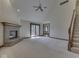 Cozy living room with brick fireplace, vaulted ceilings and deck access at 5461 Steven Dr, Greenwood, IN 46142
