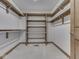 Spacious walk-in closet with built-in shelves and clothing rods at 5461 Steven Dr, Greenwood, IN 46142