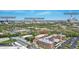 Aerial view of a red brick apartment building near downtown Indianapolis, the Indianapolis Zoo, and the IU campus at 55 S Harding St # 301, Indianapolis, IN 46222