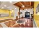 Spacious lobby with unique flooring design and wood beamed ceilings at 55 S Harding St # 301, Indianapolis, IN 46222