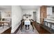An elegant dining room features hardwood floors, stylish decor, and ample natural light at 5619 Carrollton Ave, Indianapolis, IN 46220