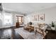 Bright living room with hardwood floors, natural light, and elegant decor and furnishings at 5619 Carrollton Ave, Indianapolis, IN 46220