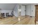Attic space with hardwood floors, access to stairs, and built-in storage at 57 Worman St, Indianapolis, IN 46227