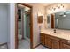 En-suite bathroom with a shower, toilet, and vanity at 572 Eagle Crest Dr, Brownsburg, IN 46112