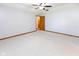 Spacious bedroom with neutral carpet and a ceiling fan at 572 Eagle Crest Dr, Brownsburg, IN 46112