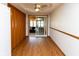 Bright dining area with sliding glass doors, wood floors and a ceiling fan at 572 Eagle Crest Dr, Brownsburg, IN 46112