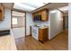 Efficient kitchen layout offering sightlines to a living room and other spaces at 572 Eagle Crest Dr, Brownsburg, IN 46112