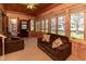 Sun room featuring wood-paneled walls and lots of natural light at 572 Eagle Crest Dr, Brownsburg, IN 46112