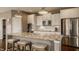 Modern kitchen with granite countertops, stainless steel appliances, and ample cabinet space at 5869 Belchamp Dr, Noblesville, IN 46062