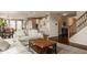 Open-concept living room with comfortable seating and seamless flow to the kitchen at 5869 Belchamp Dr, Noblesville, IN 46062