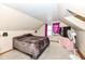 Bedroom showcasing sloped ceilings, carpet floors, and storage at 590 N 17Th St, Noblesville, IN 46060