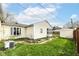 Well-maintained yard featuring a patio and lush landscaping at 590 N 17Th St, Noblesville, IN 46060