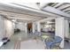 Spacious unfinished basement with laundry hookups and an exposed ceiling, providing ample space for storage and customization at 5942 Primrose Ave, Indianapolis, IN 46220