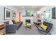 Bright and airy living room featuring contemporary furniture, stylish decor, and ample natural light at 5942 Primrose Ave, Indianapolis, IN 46220