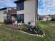 Backyard deck with green grass and garden area at 599 Cielo Vista Dr, Greenwood, IN 46143