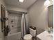 Hall bathroom featuring a shower/tub combo, single vanity, and framed mirror at 599 Cielo Vista Dr, Greenwood, IN 46143