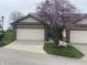 Charming townhome with well-manicured lawn, beautiful trees, attached garages and double mailboxes at 599 Cielo Vista Dr, Greenwood, IN 46143