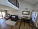 Comfortable living room and dining room with high ceilings and hardwood floors at 599 Cielo Vista Dr, Greenwood, IN 46143