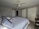 Neutral-toned main bedroom with light gray walls and a ceiling fan for added comfort at 599 Cielo Vista Dr, Greenwood, IN 46143
