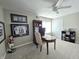 Home office with desk, shelving, sports memorabilia, and ceiling fan at 599 Cielo Vista Dr, Greenwood, IN 46143