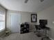 Office with a sleek desk, a rolling computer chair, and natural light at 599 Cielo Vista Dr, Greenwood, IN 46143