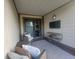 Covered outdoor patio area with comfortable seating at 599 Cielo Vista Dr, Greenwood, IN 46143