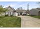 Charming single-story home with a well-manicured lawn and inviting curb appeal at 6846 Emerald Bay Ln, Indianapolis, IN 46237