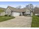 Charming single-story home with a well-manicured lawn and inviting curb appeal at 6846 Emerald Bay Ln, Indianapolis, IN 46237
