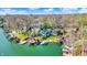 Aerial view of lake homes with private docks showcasing the community's access to the water at 7003 Eagle Dr, Nineveh, IN 46164