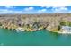 Aerial view of waterfront homes showing lake access and a serene, green surrounding landscape at 7003 Eagle Dr, Nineveh, IN 46164