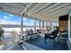 Exterior view of a cozy balcony with seating and a gorgeous lake view at 7003 Eagle Dr, Nineveh, IN 46164