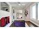 Fun bunk room features built-in bunk beds, hardwood floors, and a window at 7003 Eagle Dr, Nineveh, IN 46164