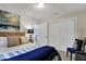 Bedroom featuring a bed, closet, nautical decorations, and a window at 7003 Eagle Dr, Nineveh, IN 46164